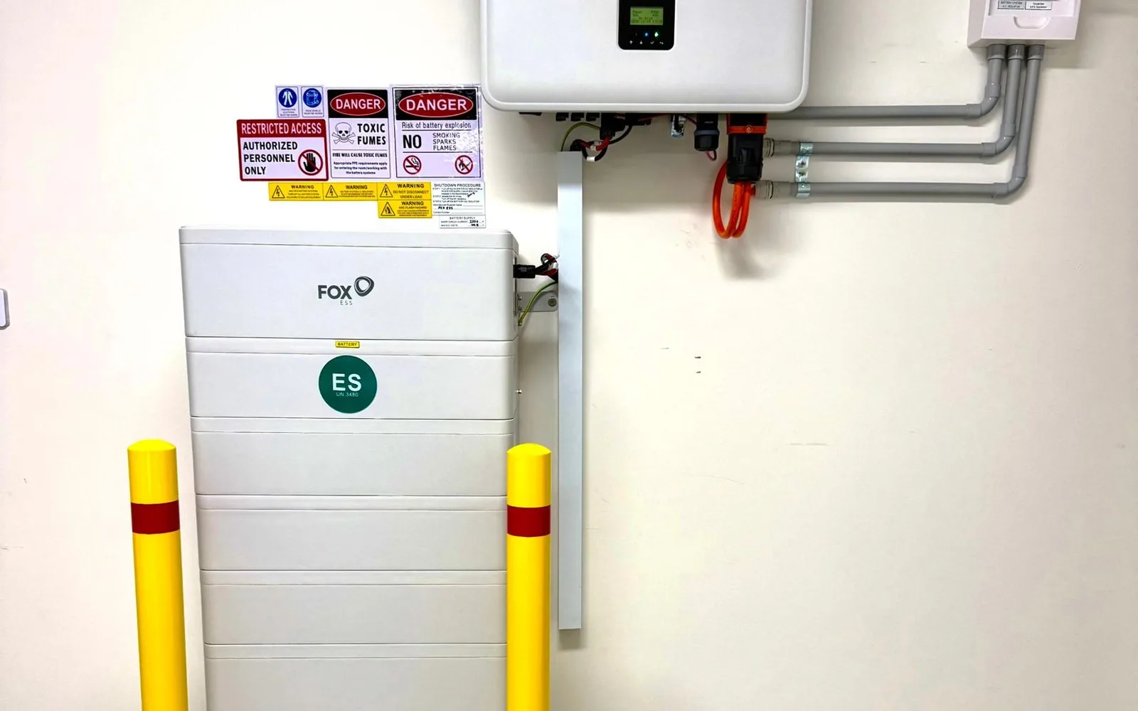 Fox ESS home battery and hybrid inverter installed in a garage