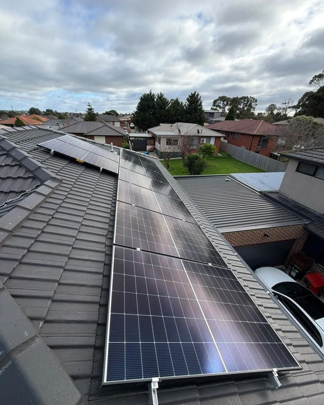 Solar panels mounted on a tiled roof