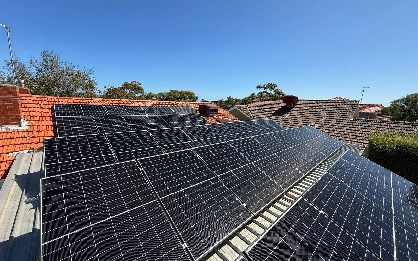 Solar panels installed on a metal roof in Melbourne